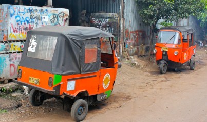These bajais wait outside a south Jakarta repair shop that has helped keep them on the road for over 30 years.