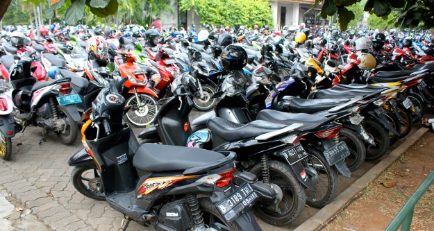 With a motorcycle, parking at Jakarta's crowded malls is a little more efficient. 