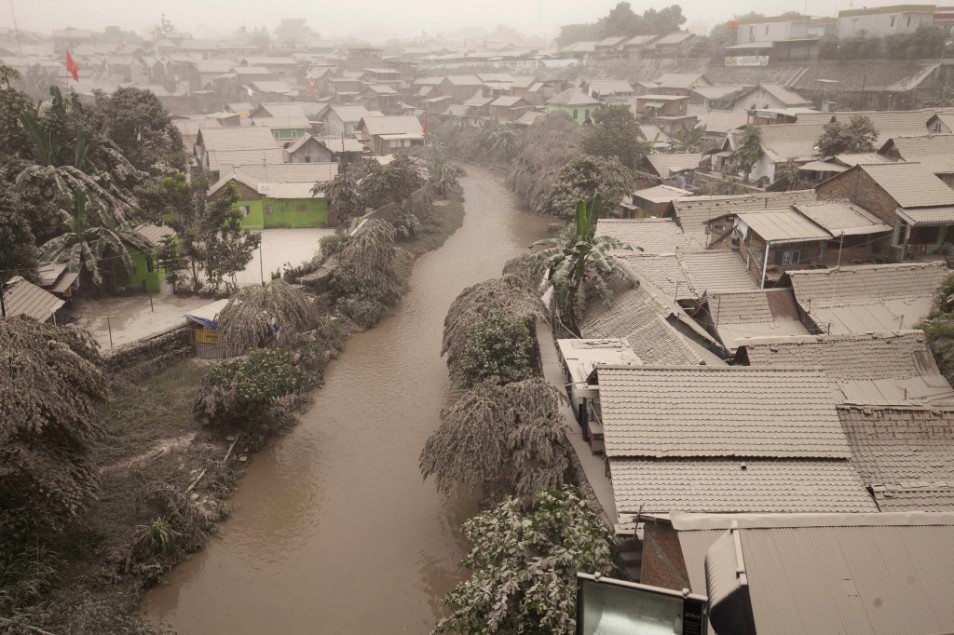 Homes near the volcano were dusted with ash (reuters)