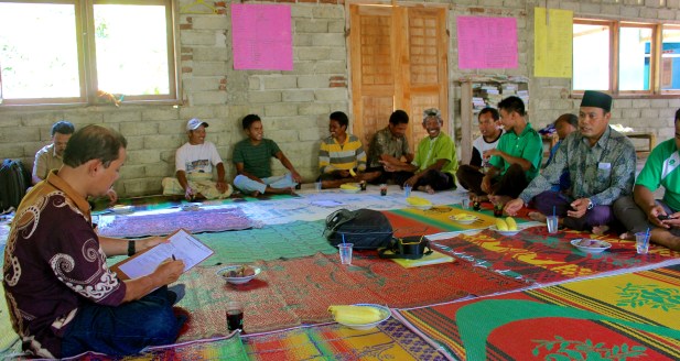On the other side of the rooms, the men munched on corn, sweet potatoes and bananas.